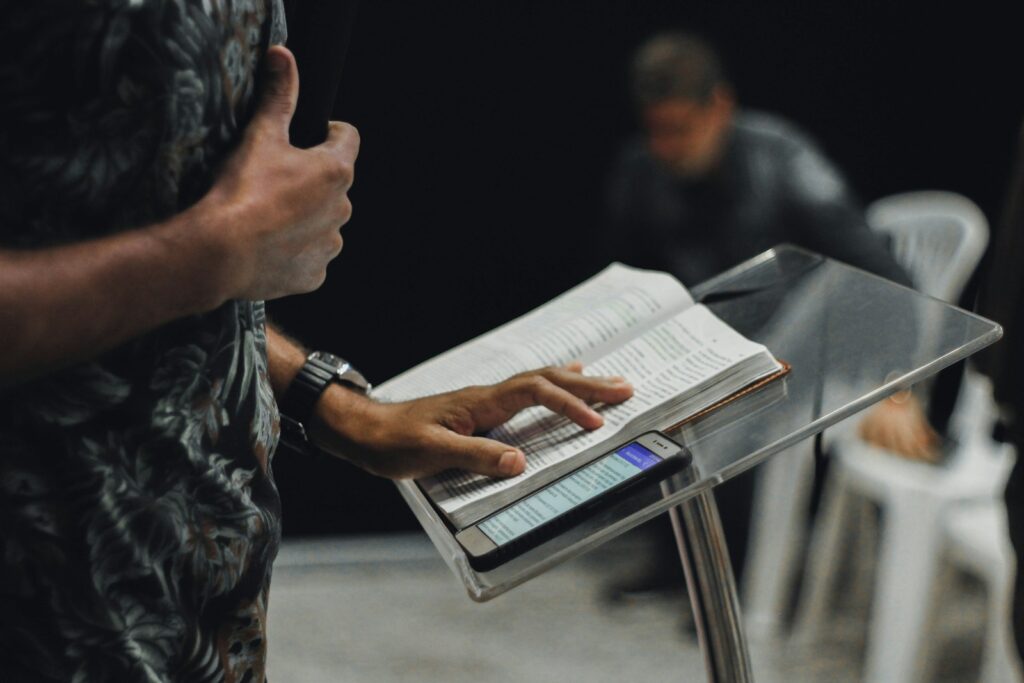 Photo by Nycholas Benaia Millennial Pastor Preaching